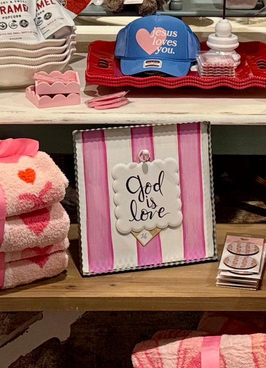 Pink and white striped display board